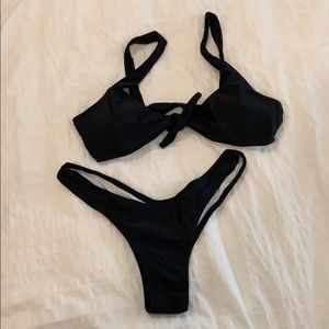 Black two piece front tie top swim suit, size M